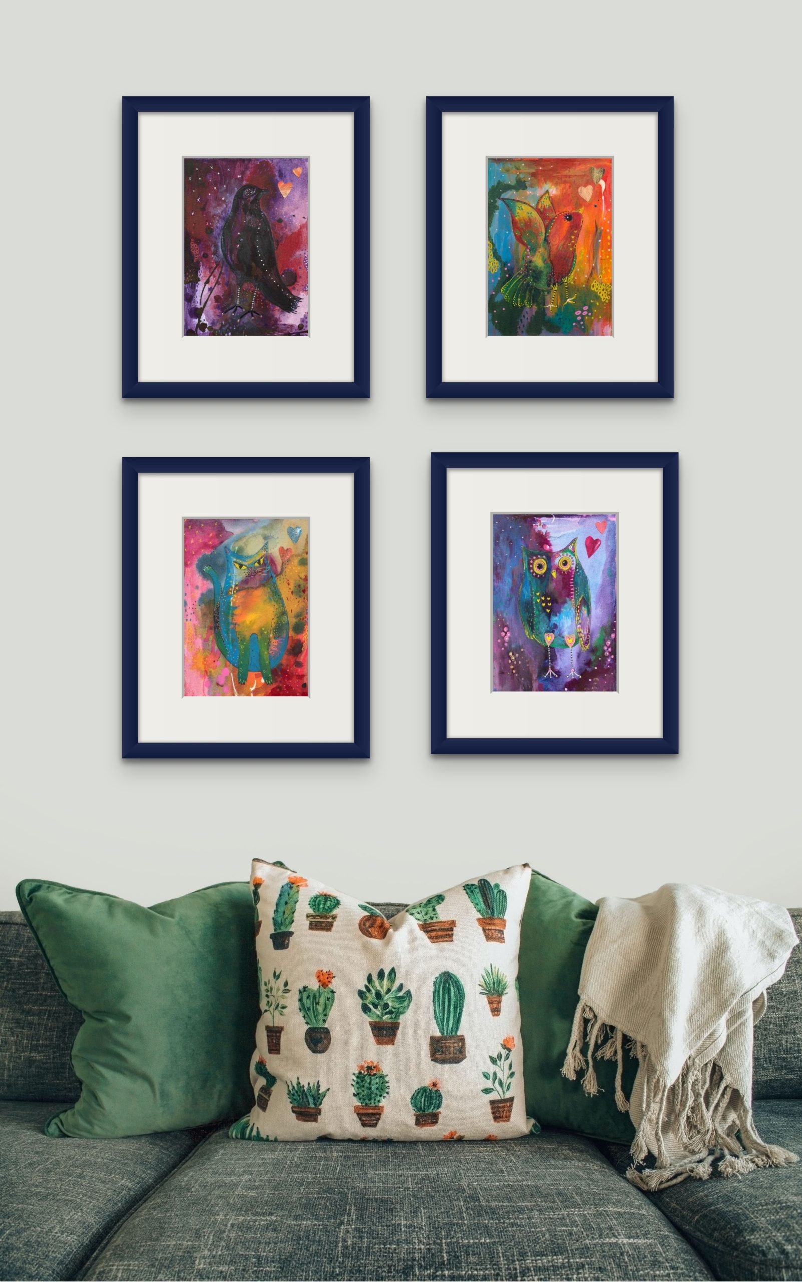vibrant limited edition animal prints on card - A mystical purple-red toned crow, A purple-blue toned whimsical owl, A bright multicoloured cat and an orange-red bird.