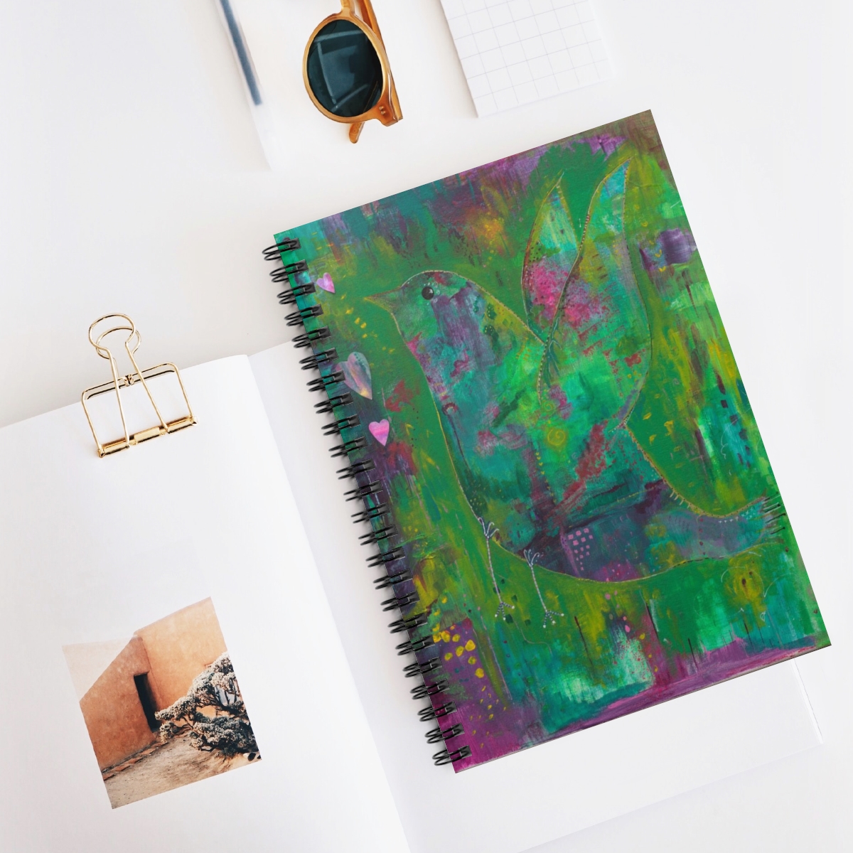 Special whimsical bird Journal in context Whimsical abstract bird taking flight created using layers of green and purple acrylic paints.
