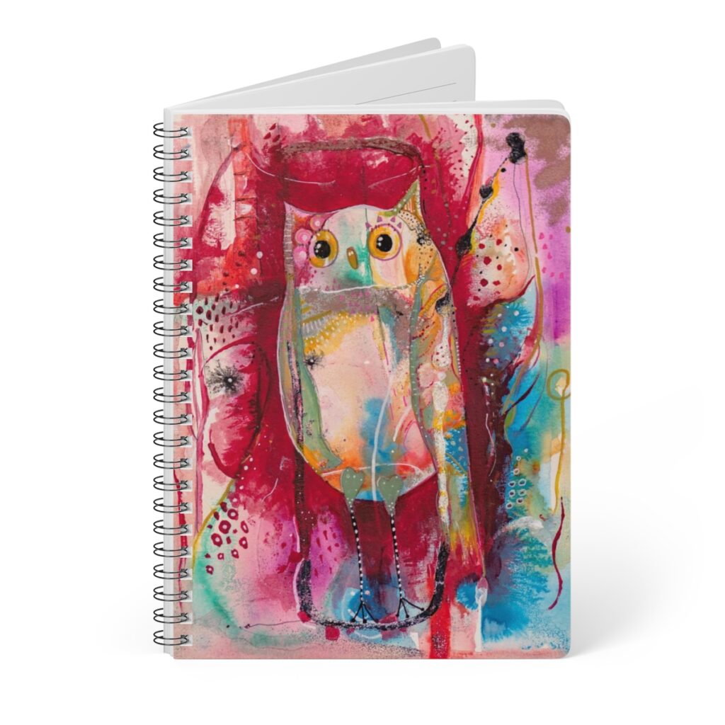 Whimsical owl notebook standing up- Owl is multi-coloured on an abstract background.