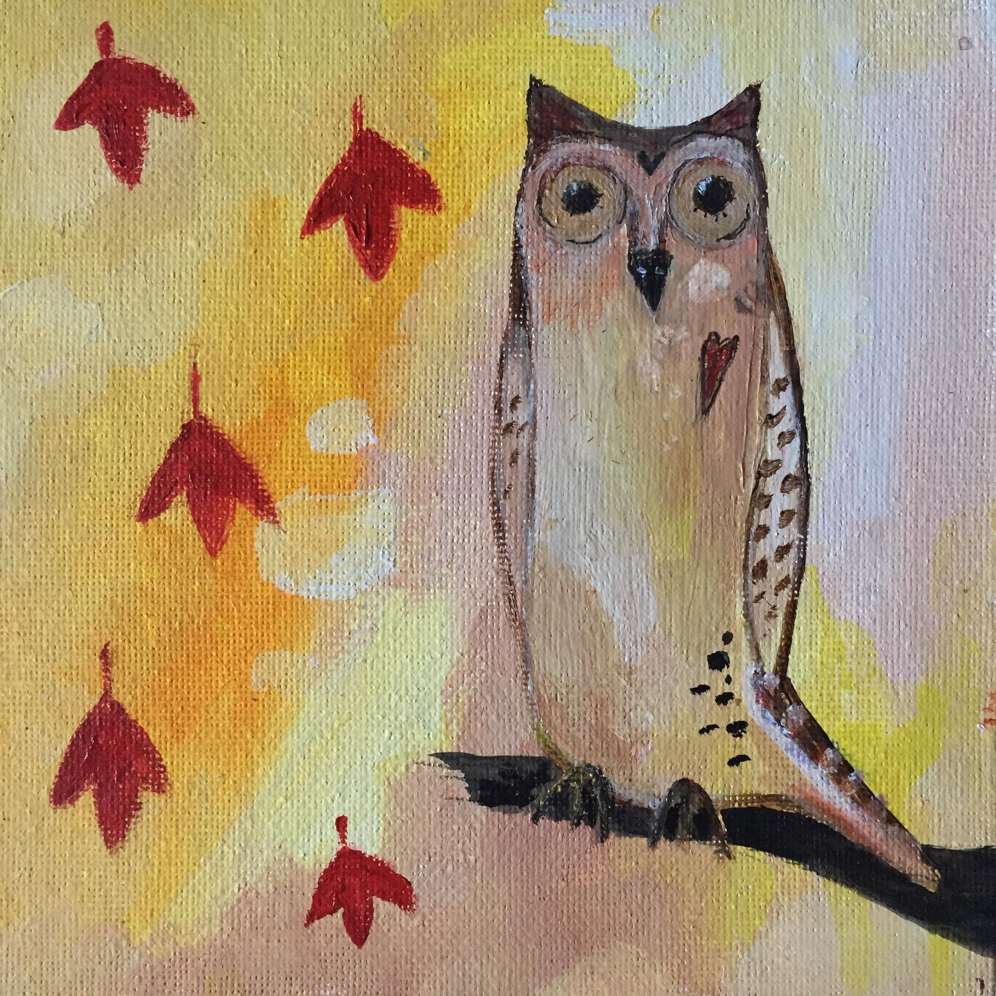 owl painting. Wise, whimsical owl stands tall on a black branch against a golden yellow and cream background. 5 red leaves fall beside her.