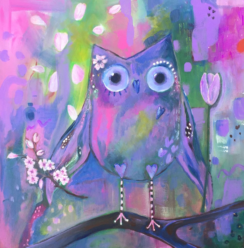 Beautiful owl art painted in tones of pink, purple and green. She holds a sprig of cherry blossom in her left wing and a pink tulip in the other. Cherry blossom petals float down beside her as she stands on a branch ready to fly.